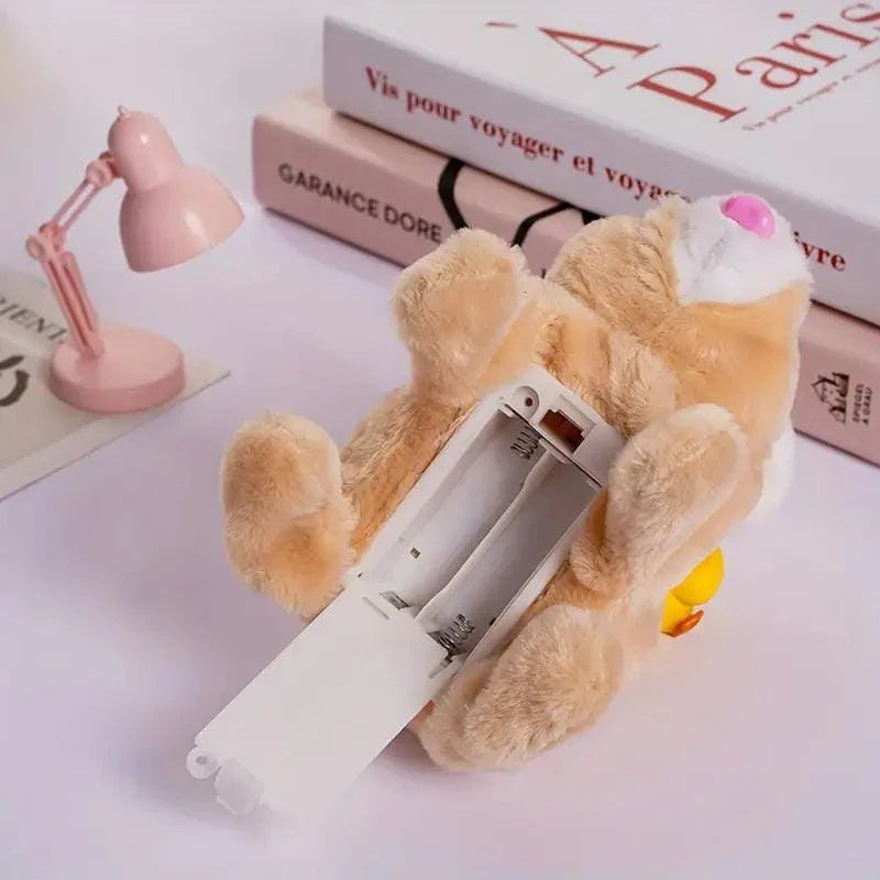 Plush toy bear in a pink outfit with a strawberry on a wooden surface