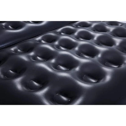 Close-up of an inflatable mattress with a pattern of raised dome shapes.