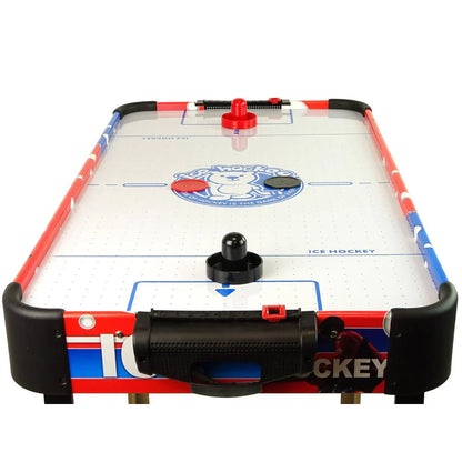 Air hockey table with red, blue, and white design on a white background