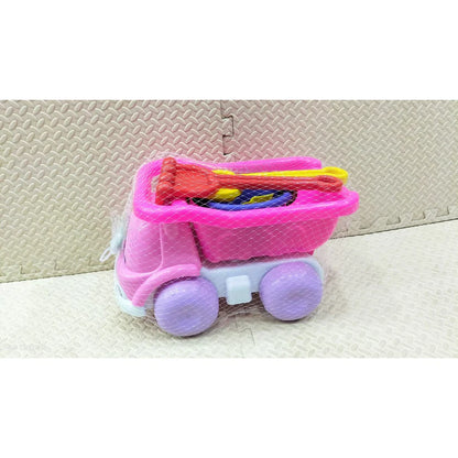 Pink toy truck with purple wheels on a textured surface