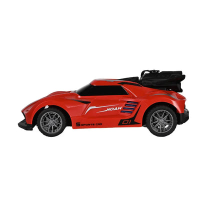 Red toy car with black accents on a white background