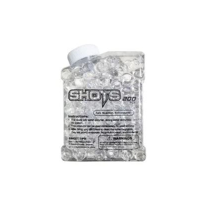 Set of toy vehicles including a fire truck, police car, and ambulance with a baby in the background.